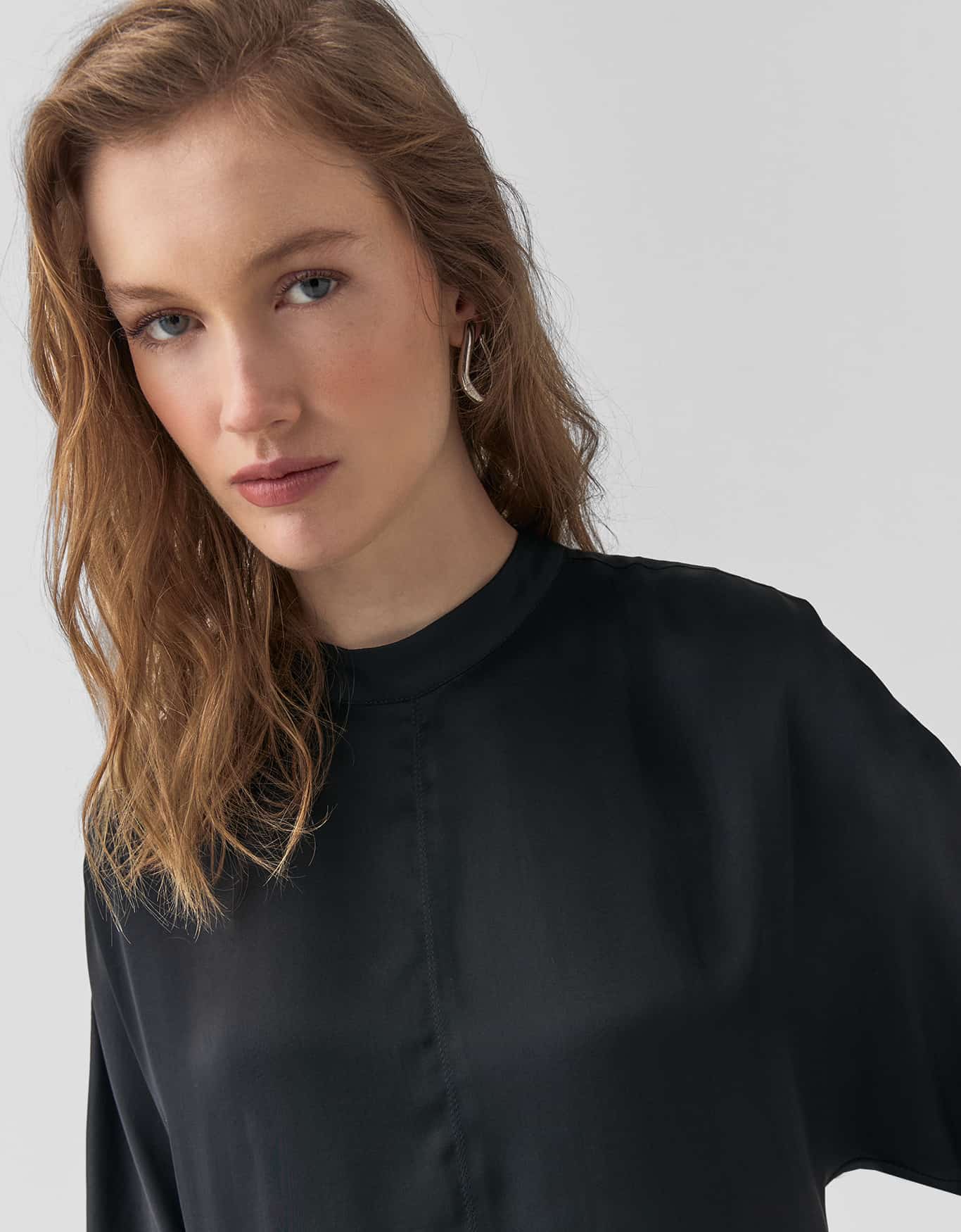 Blusa Manga Curta Assimétrica