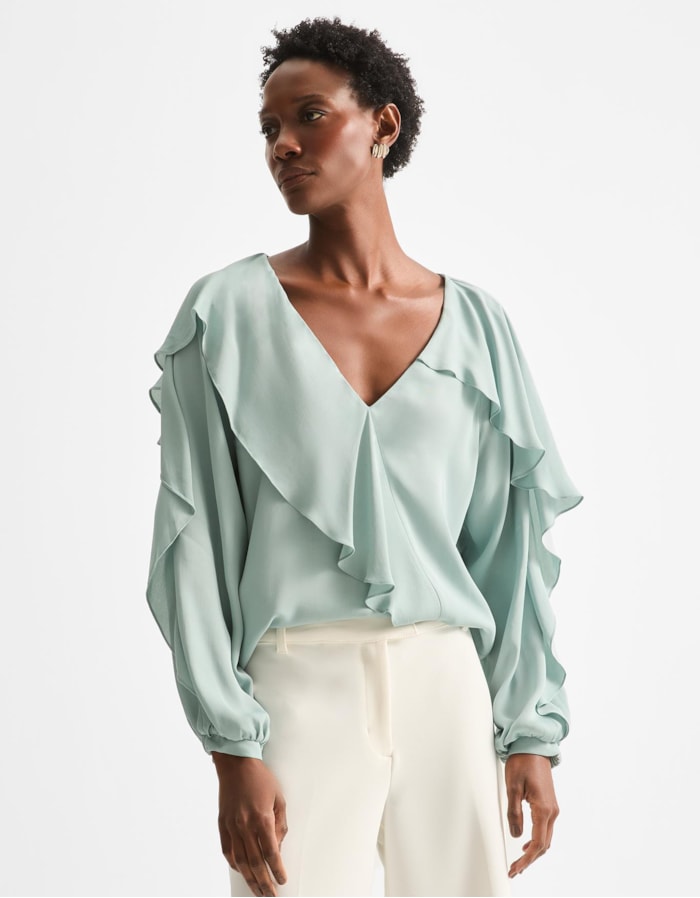 Blusa Manga Longa Babados