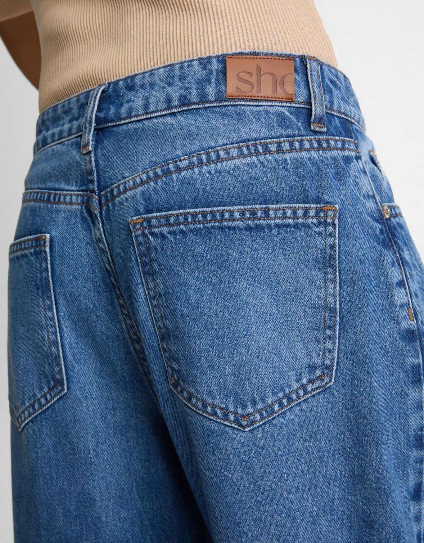 Calça Jeans Wide Pregas