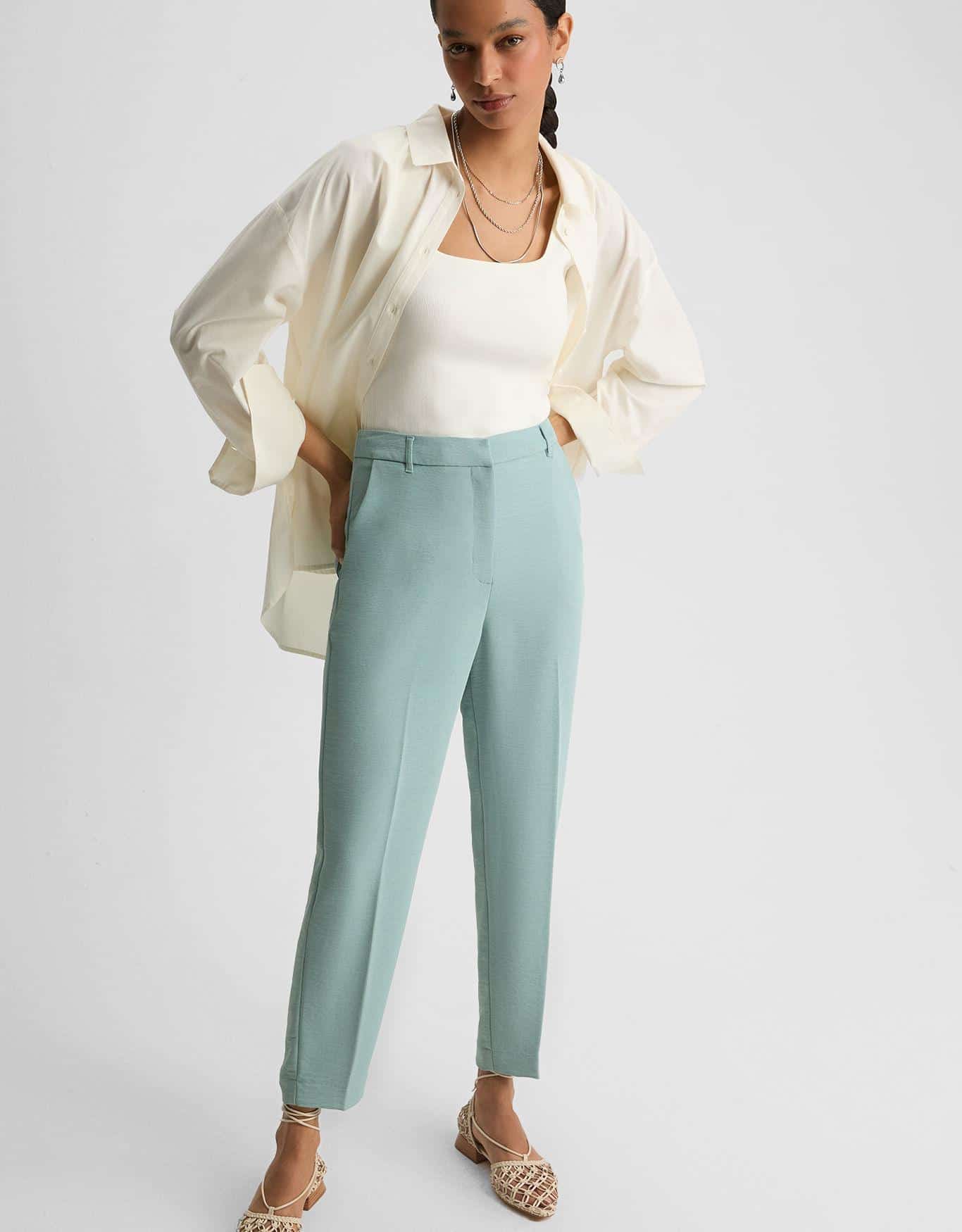 Calça Slim Com Bolsos