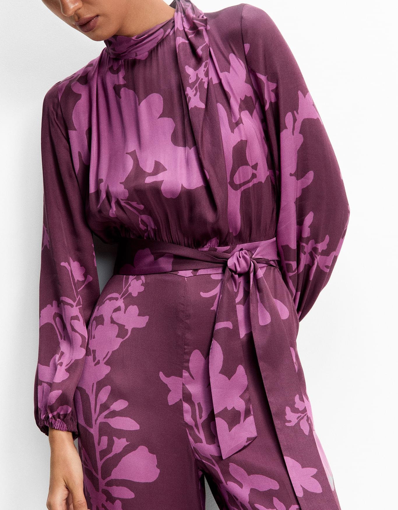 Macacão Manga Longa Floral Fucsia