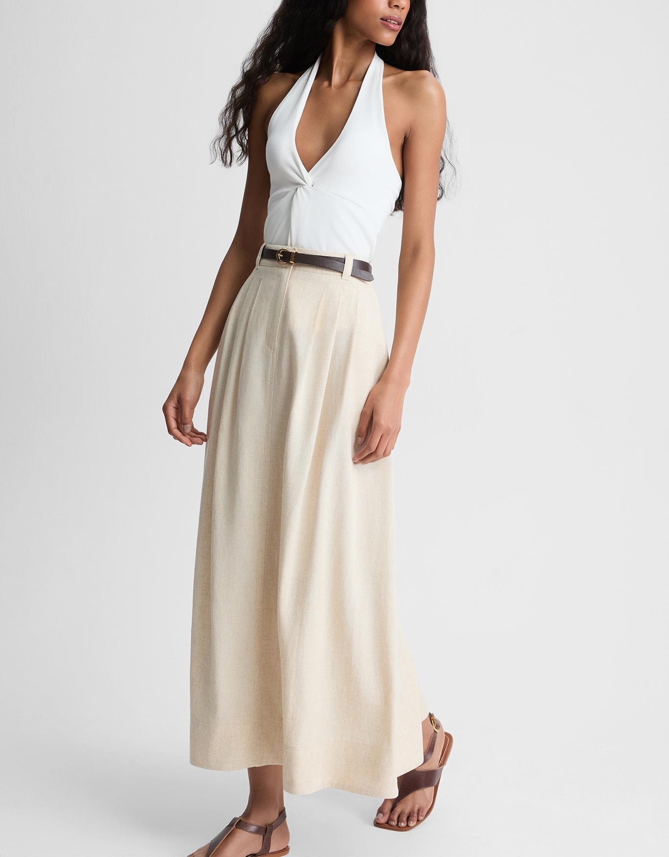 Saia Midi Evasê Pregas